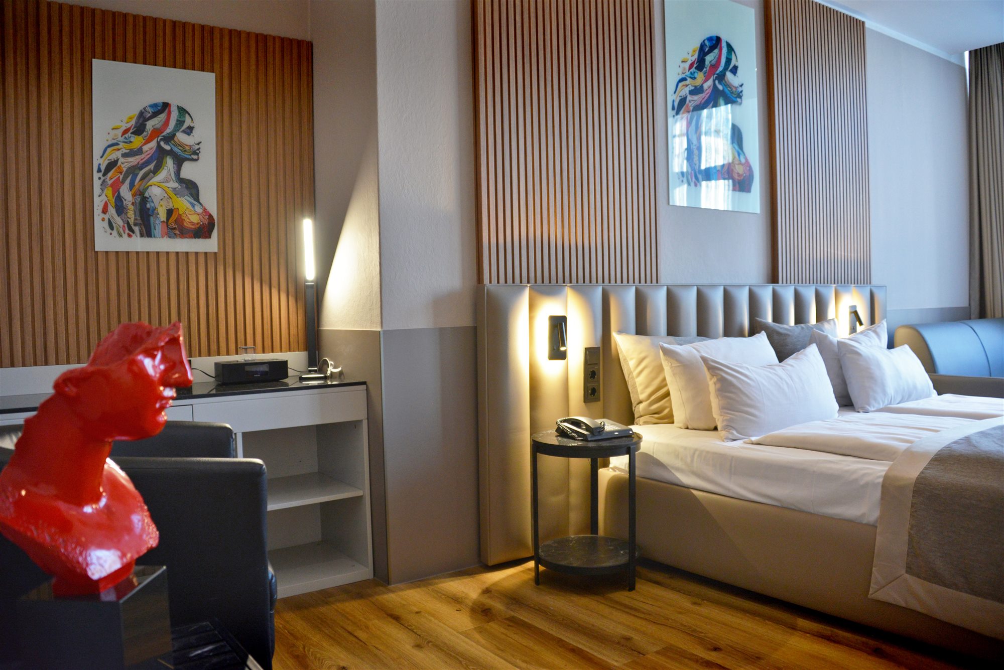Double room with red sculpture